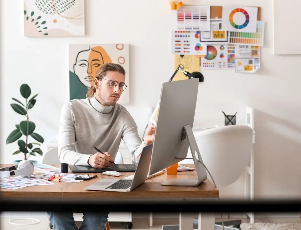 Professional UX/UI web designer working on a clean interface, representing the expertise offered by Z Web&Co, z web and co